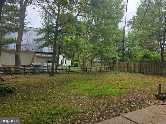 a view of backyard with green space