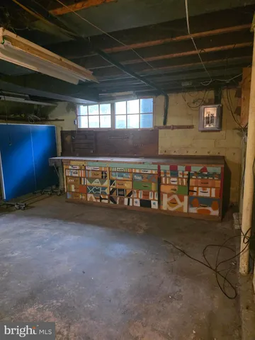 a view of an empty room with windows