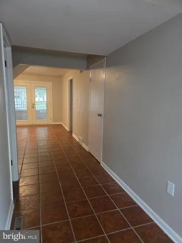 a view of hallway with windows