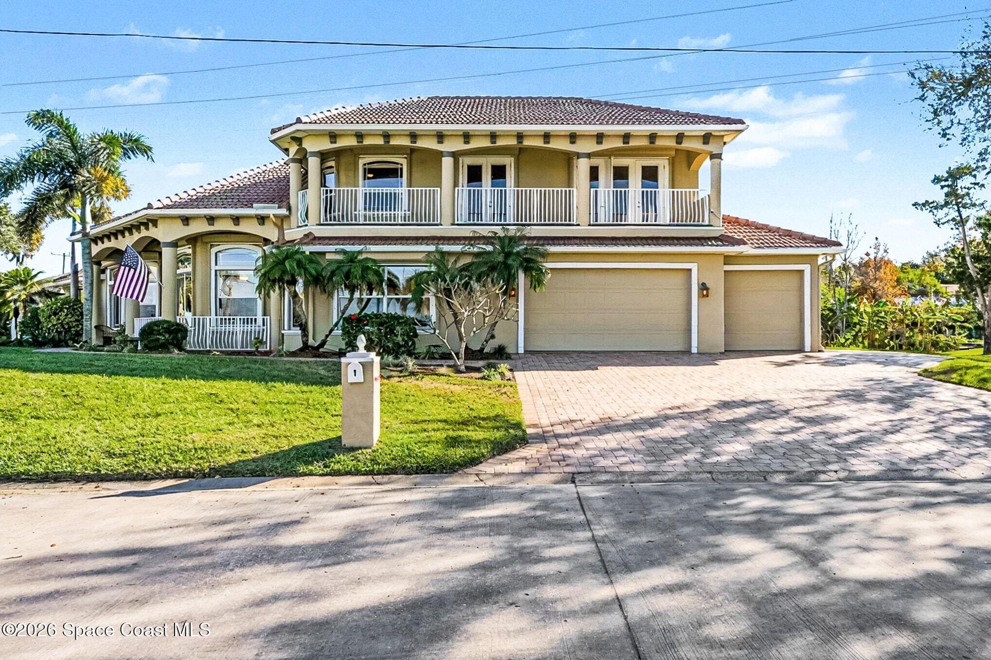 1 Point View Place Cocoa, FL 32926 - Photo 1 of 45 a front view of a house with a yard