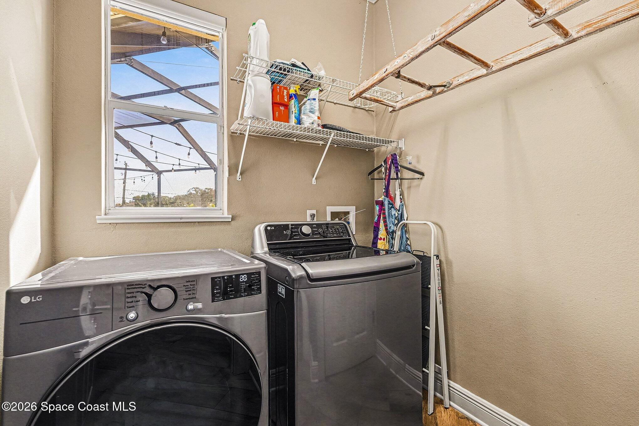 1 Point View Place Cocoa, FL 32926 - Photo 13 of 45 a utility room with dryer and washer