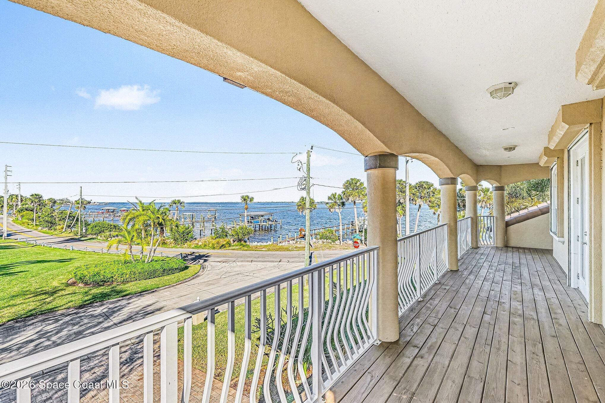 1 Point View Place Cocoa, FL 32926 - Photo 27 of 45 a view of a balcony with wooden floor