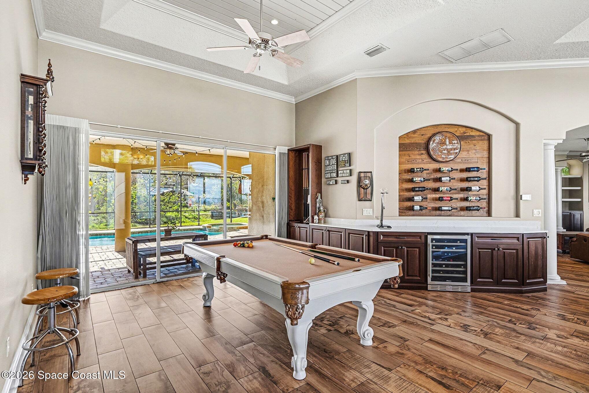1 Point View Place Cocoa, FL 32926 - Photo 3 of 45 a living room with furniture a large window with wooden floor