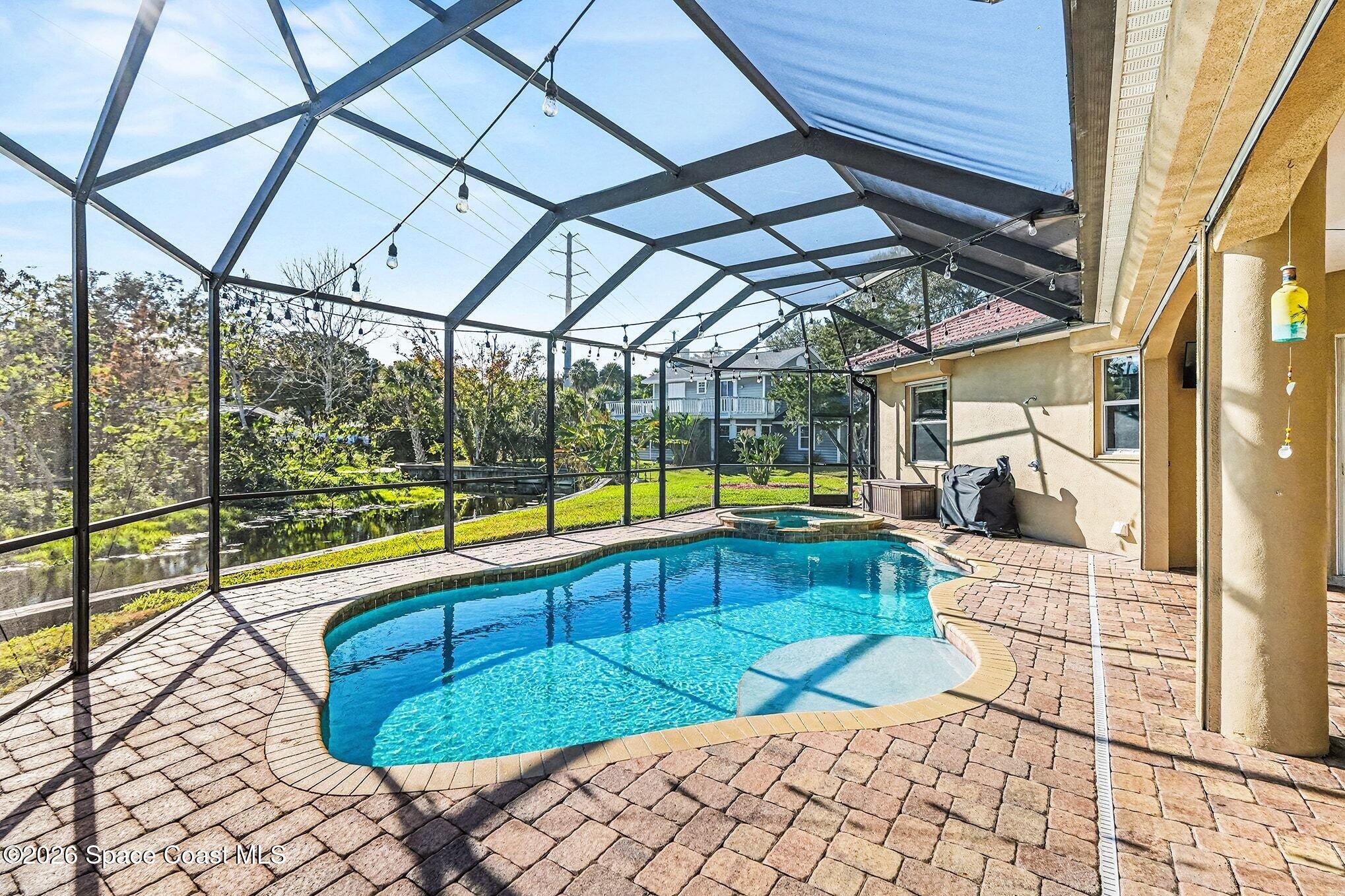 1 Point View Place Cocoa, FL 32926 - Photo 31 of 45 a view of a swimming pool with a porch