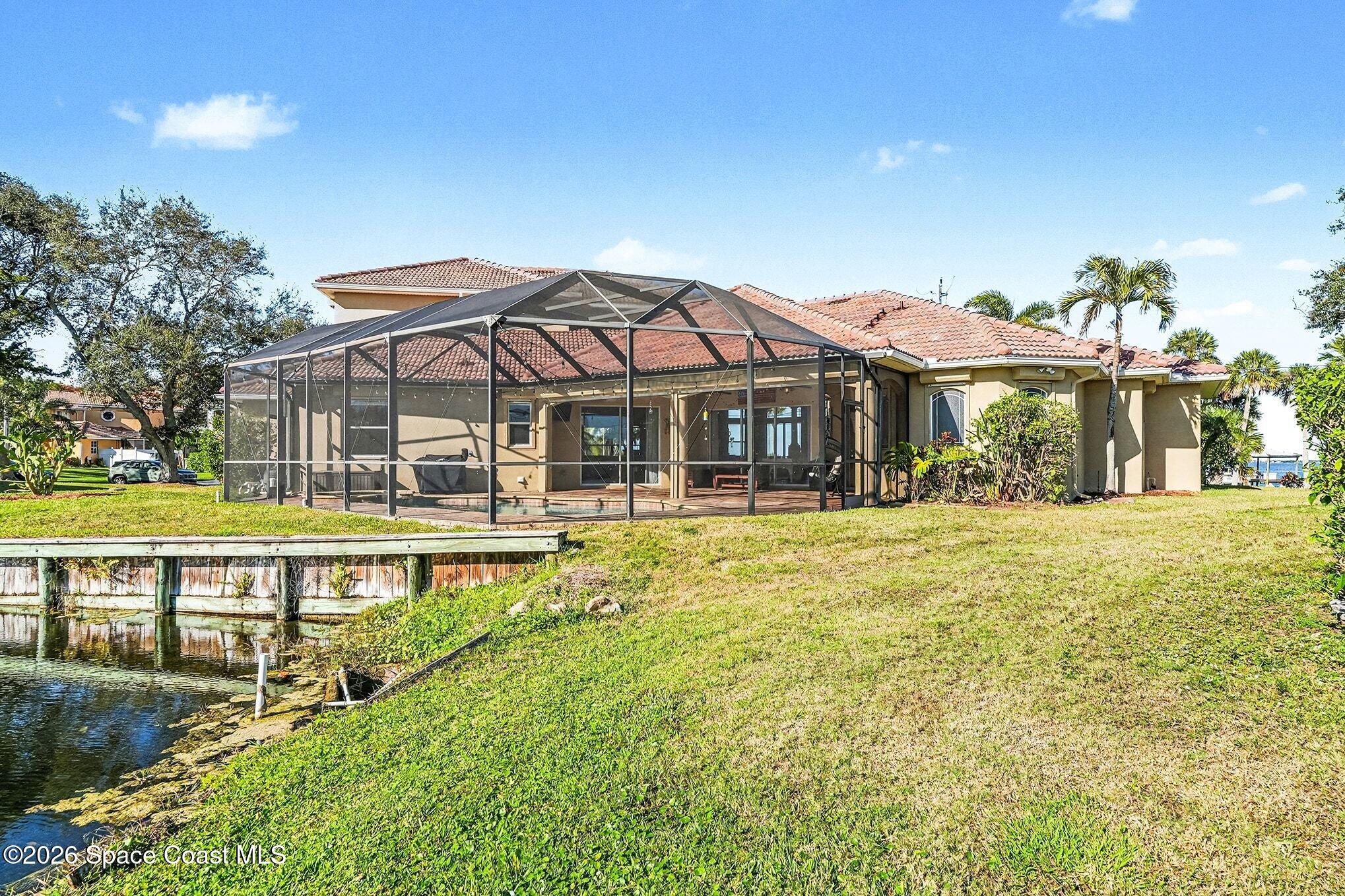 1 Point View Place Cocoa, FL 32926 - Photo 33 of 45 a view of a house with swimming pool