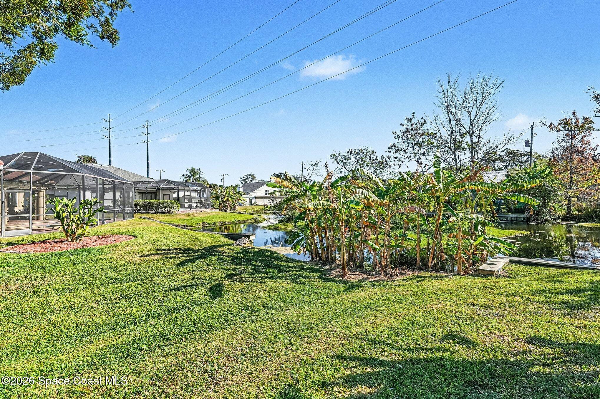 1 Point View Place Cocoa, FL 32926 - Photo 34 of 45 a view of yard with swimming pool
