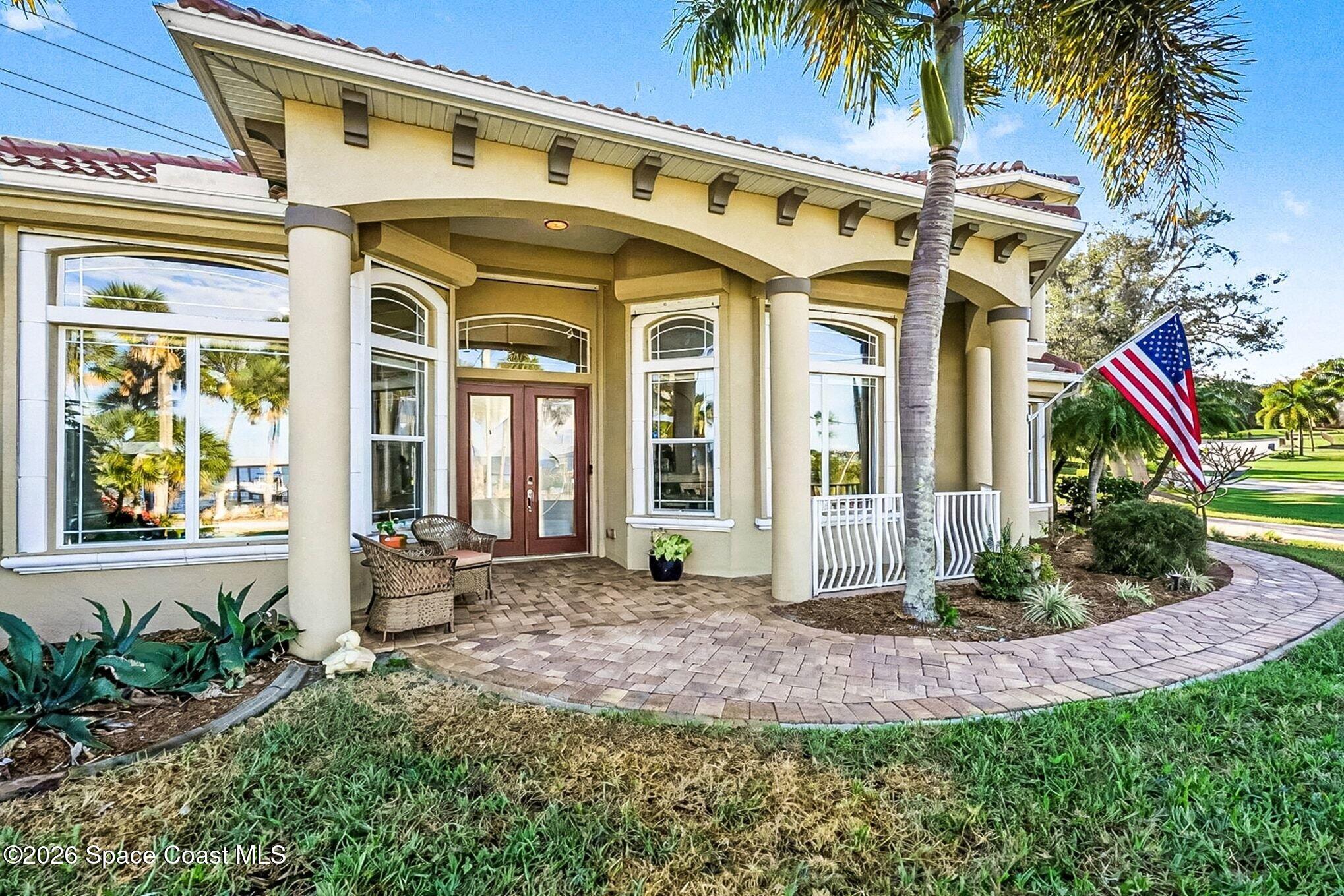 1 Point View Place Cocoa, FL 32926 - Photo 42 of 45 a front view of a house with a porch