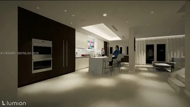 a view of a dining room with furniture and a fireplace