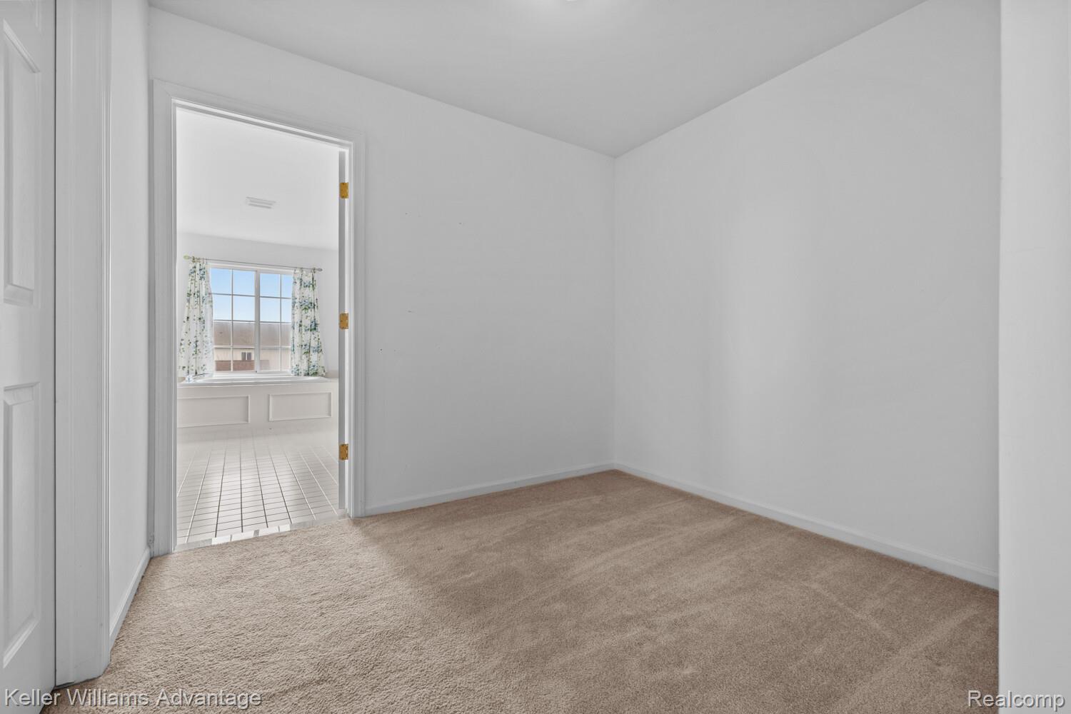 4100 Norwich Court Rochester, MI 48306 - Photo 35 of 72 Unfurnished room featuring light colored carpet and baseboards