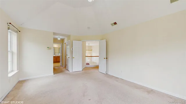 a view of empty room with an empty room