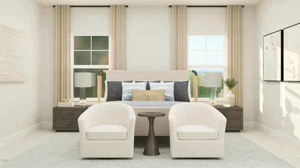 a bedroom with furniture and a potted plant