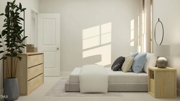 a bedroom with a bed and a potted plant