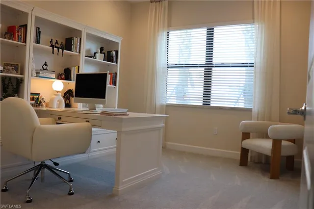 a dinning table and chairs in the open kitchen