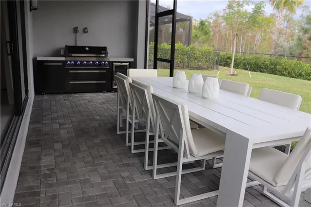 a stove top oven sitting inside of a kitchen