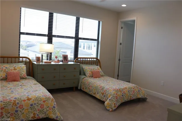 a white toilet sitting next to a bath tub