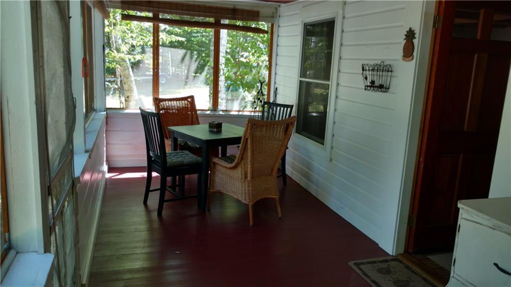3 Sibley Street Raymond, ME 04071 - Photo 11 of 24 front screened porch