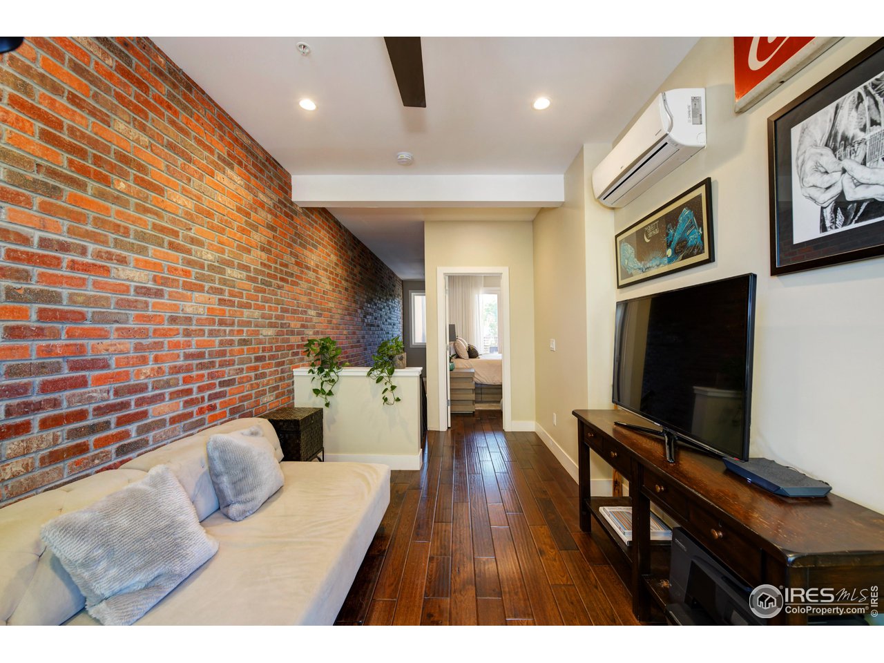 1217 High Street Boulder, CO 80304 - Photo 19 of 31 a living room with furniture and a flat screen tv
