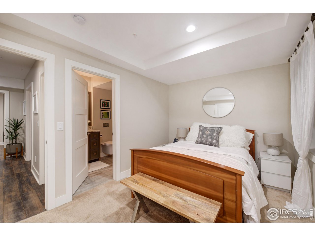 1217 High Street Boulder, CO 80304 - Photo 23 of 31 a bedroom with a bed and a dresser