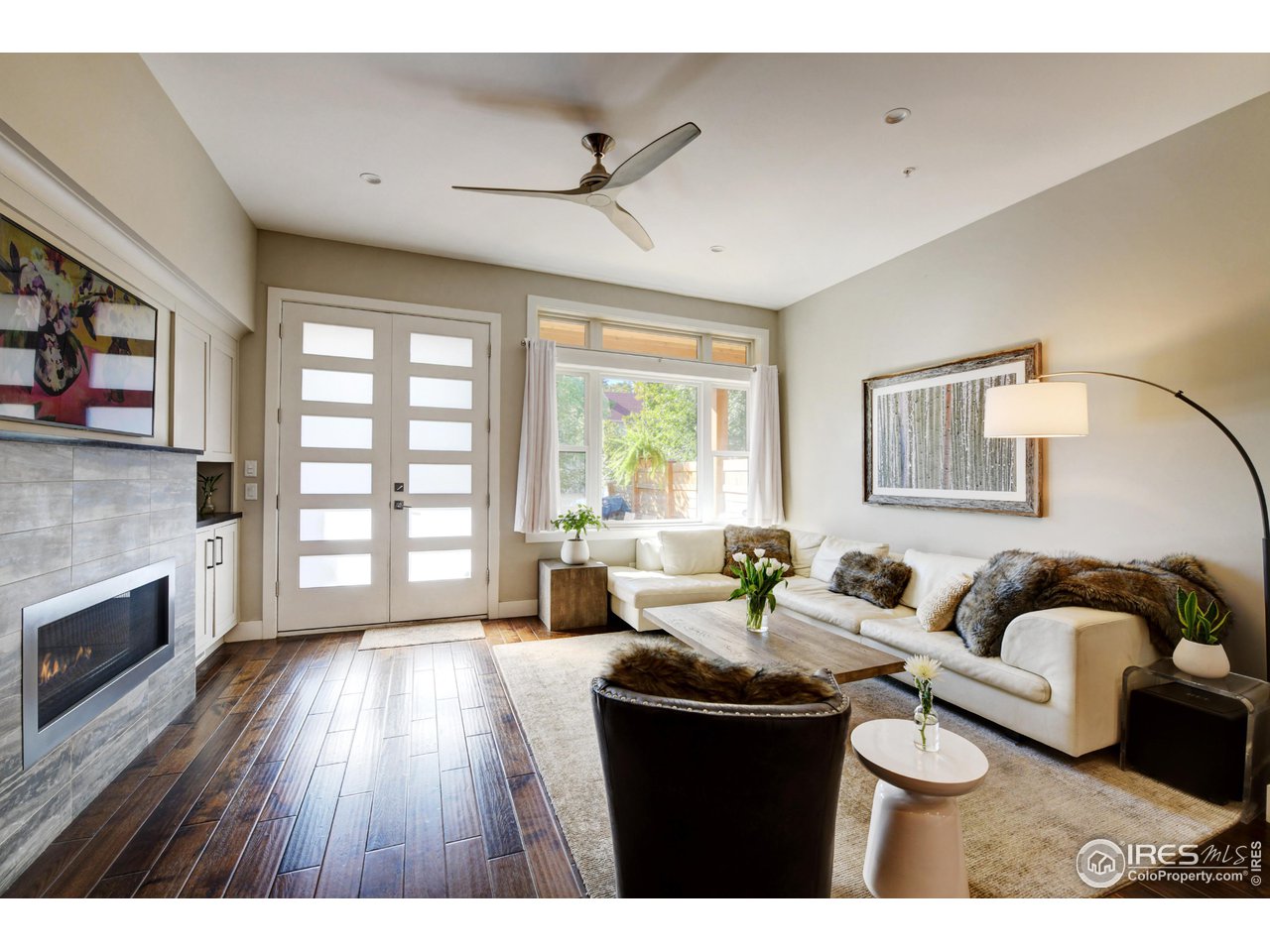 1217 High Street Boulder, CO 80304 - Photo 3 of 31 a living room with furniture fireplace and flat screen tv