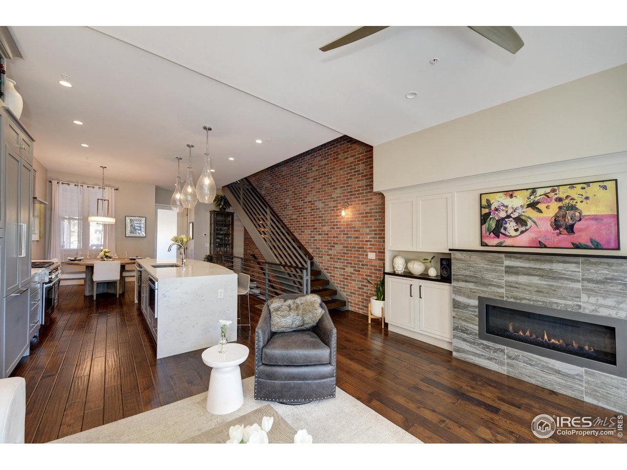 1217 High Street Boulder, CO 80304 - Photo 5 of 31 a living room with furniture and a fireplace
