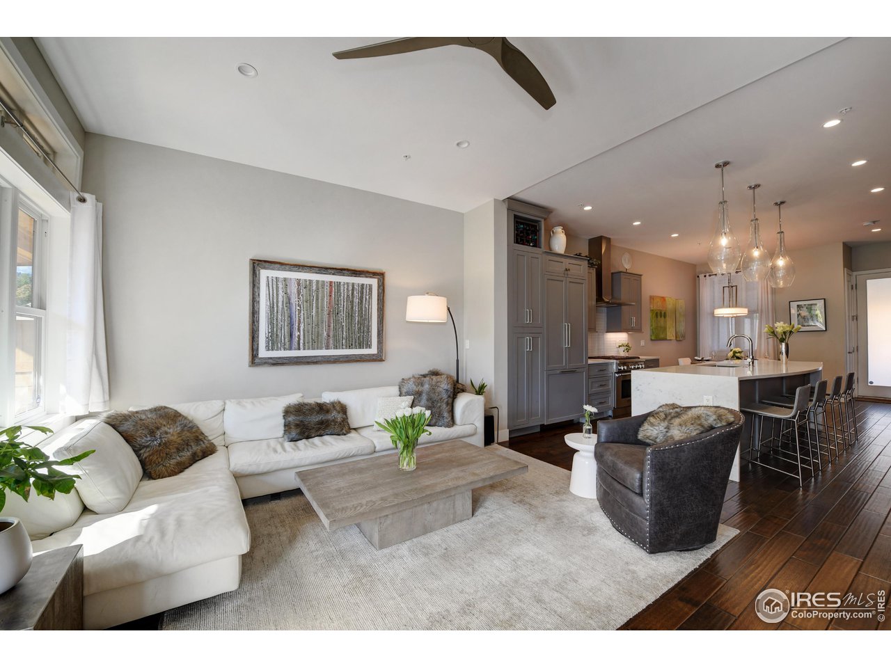 1217 High Street Boulder, CO 80304 - Photo 6 of 31 a living room with furniture and a wooden floor