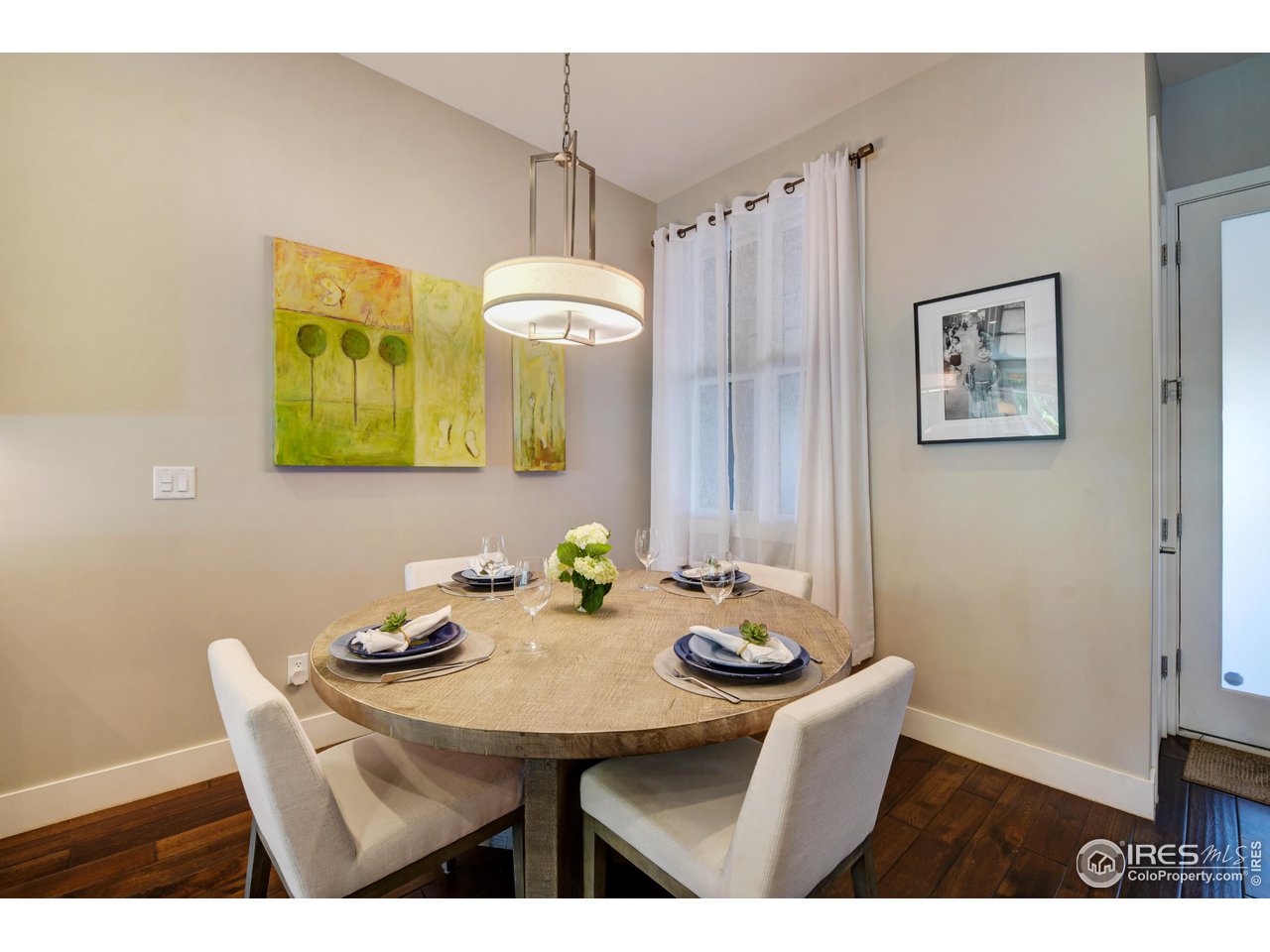 1217 High Street Boulder, CO 80304 - Photo 9 of 31 a view of a dining room with furniture and wooden floor