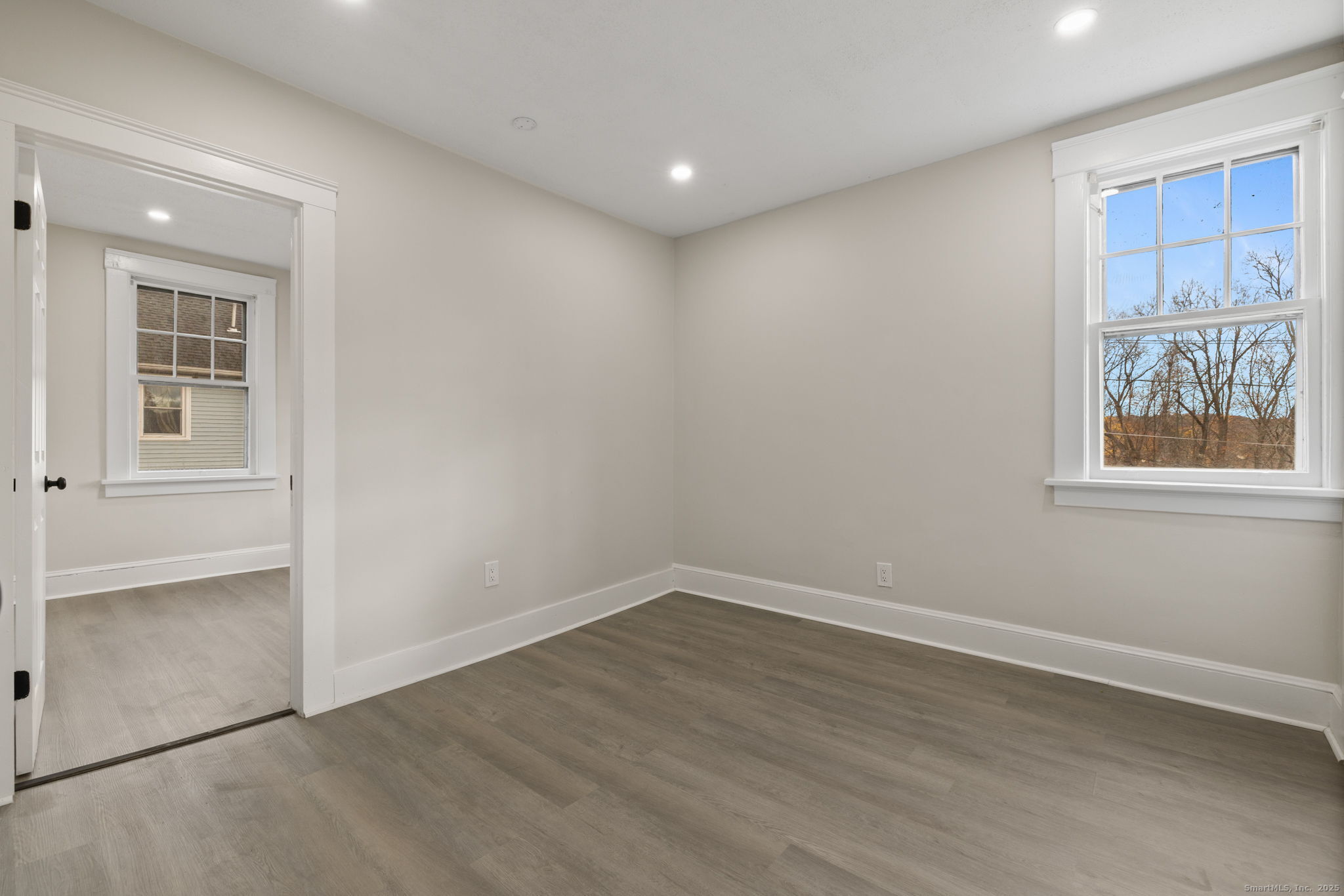 19 Henry Street Watertown, CT 06779 - Photo 18 of 37 an empty room with windows and closet