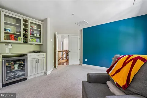 a bed room with a bed and a baby bed