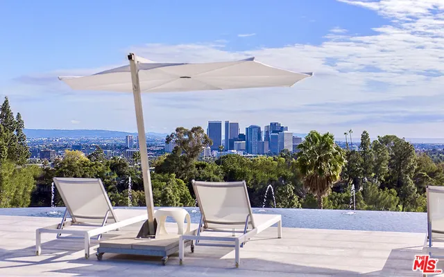 a view of a terrace with sitting area