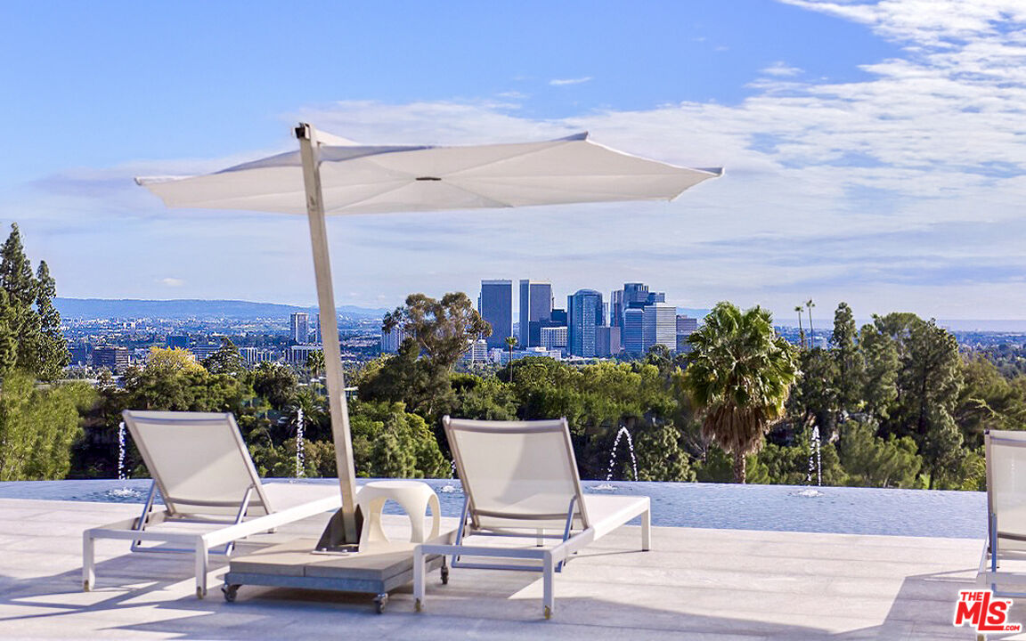 a view of a terrace with sitting area
