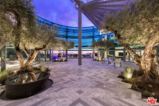 a view of a chairs and tables in the patio