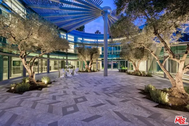 a view of a pathway with a patio