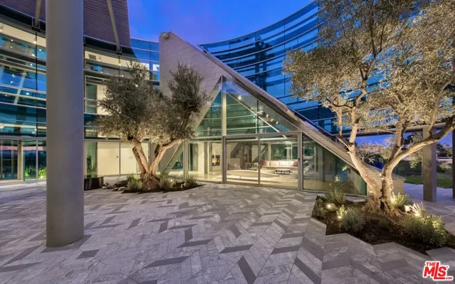 a house with trees in front of it