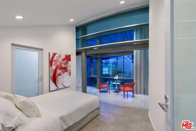 a view of swimming pool with outdoor seating