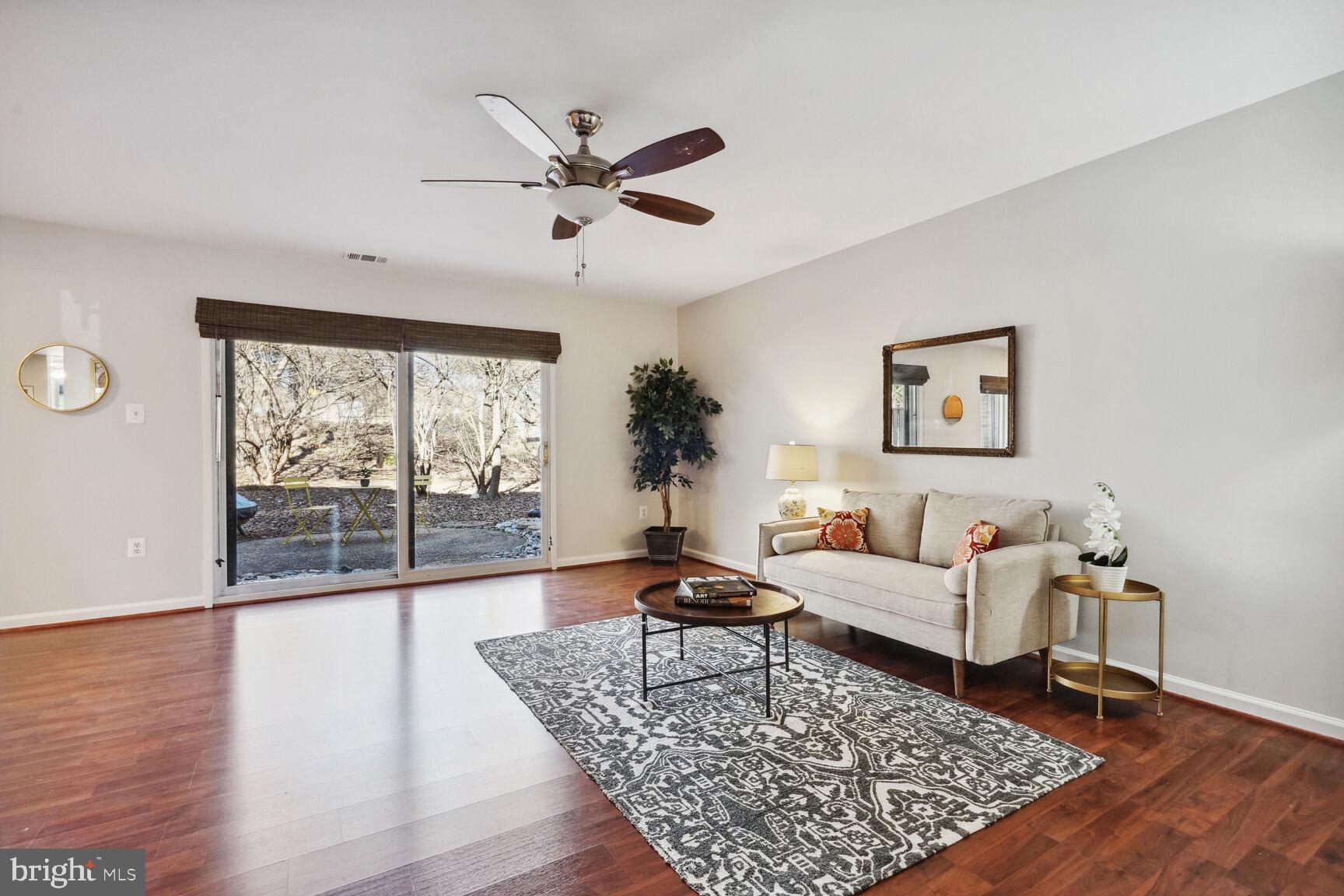 1747 Ivy Oak Square Reston, VA 20190 - Photo 14 of 31 Living Room and Walk-out Patio