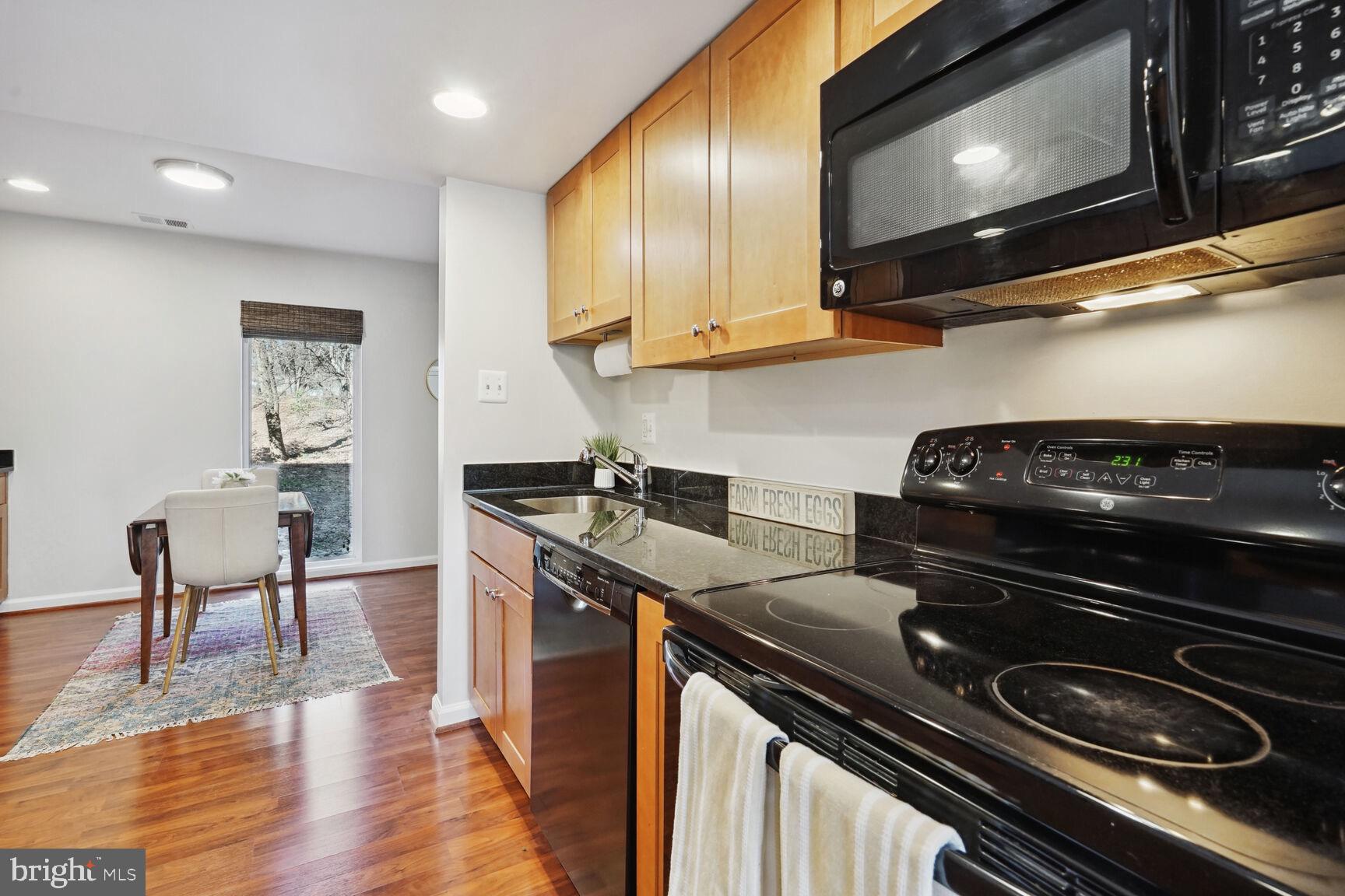 1747 Ivy Oak Square Reston, VA 20190 - Photo 7 of 31 Kitchen into Dining Area
