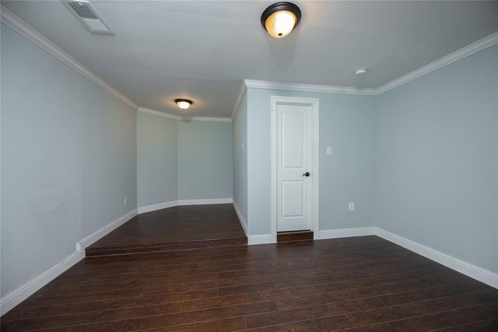 10500 Musketball Place McKinney, TX 75072 - Photo 27 of 40 a view of empty room with wooden floor