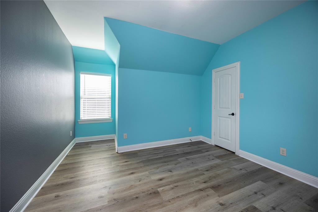 10500 Musketball Place McKinney, TX 75072 - Photo 31 of 40 an empty room with wooden floor and closet
