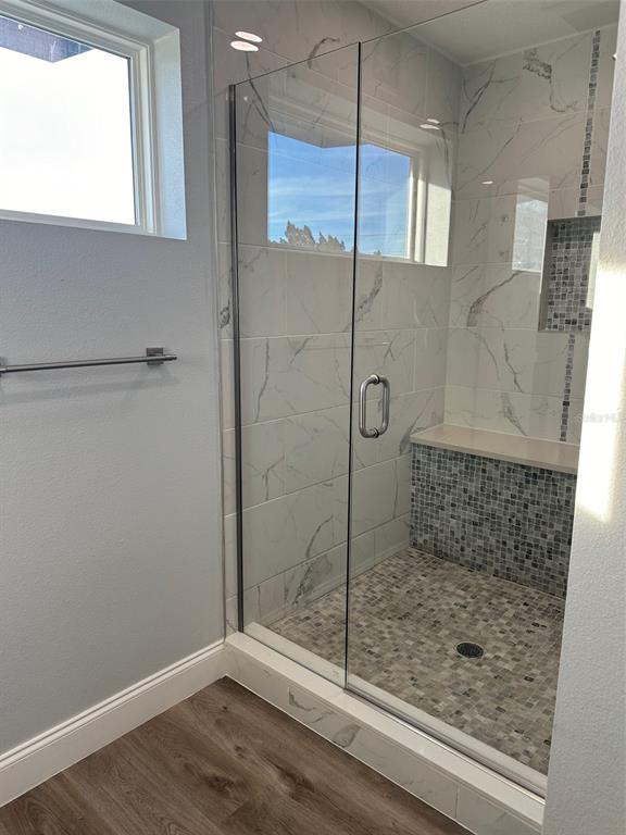 7119 Fair Lane Hudson, FL 34667 - Photo 14 of 32 a bathroom with a shower