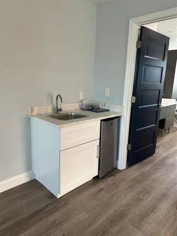 a utility room with washer and dryer