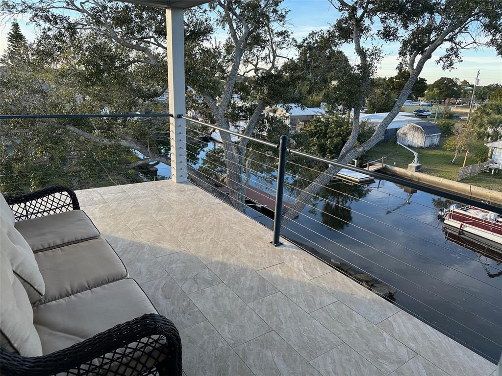 7119 Fair Lane Hudson, FL 34667 - Photo 21 of 32 a view of balcony with furniture