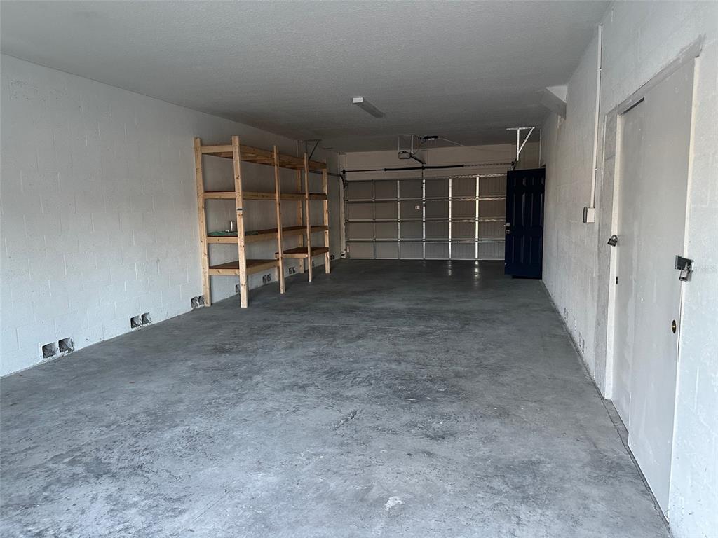 7119 Fair Lane Hudson, FL 34667 - Photo 24 of 32 an empty room with a furniture and closet
