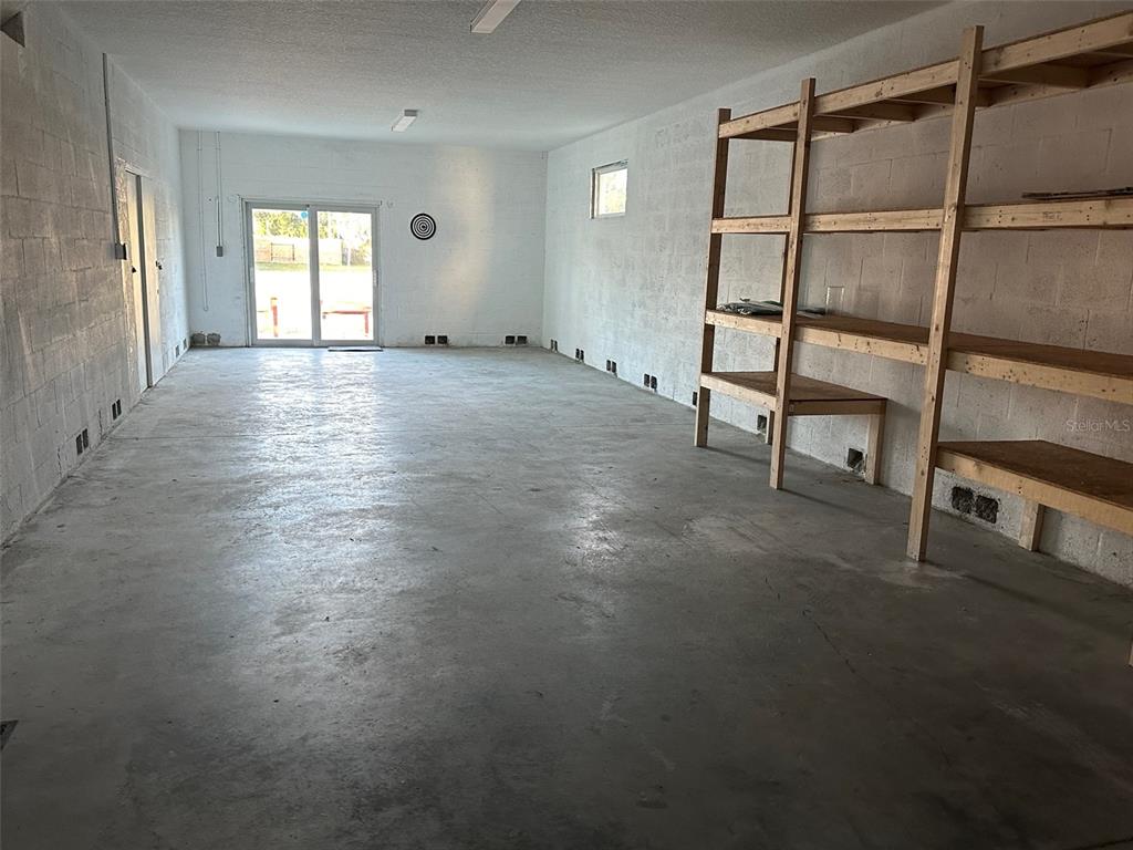 7119 Fair Lane Hudson, FL 34667 - Photo 25 of 32 a view of an empty room with a window