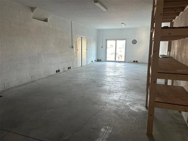 a view of a swimming pool with a chairs