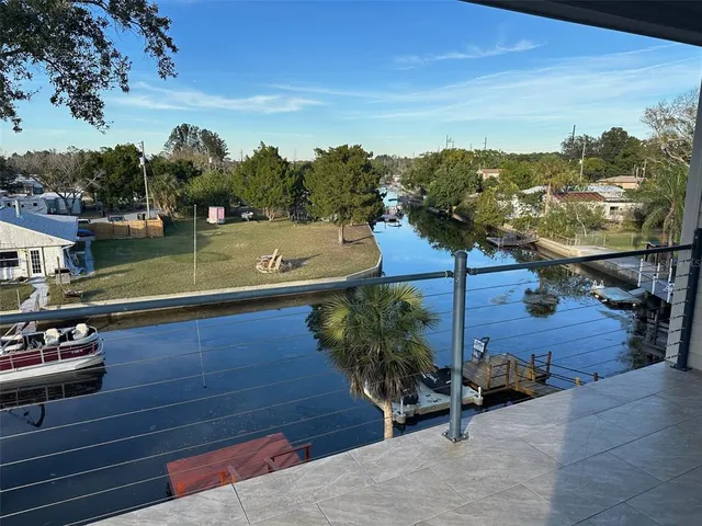 a view of a terrace with sitting area