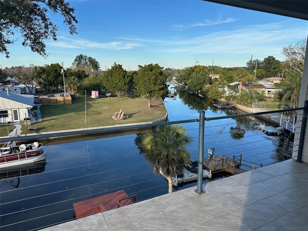 7119 Fair Lane Hudson, FL 34667 - Photo 3 of 32 a view of a terrace with sitting area
