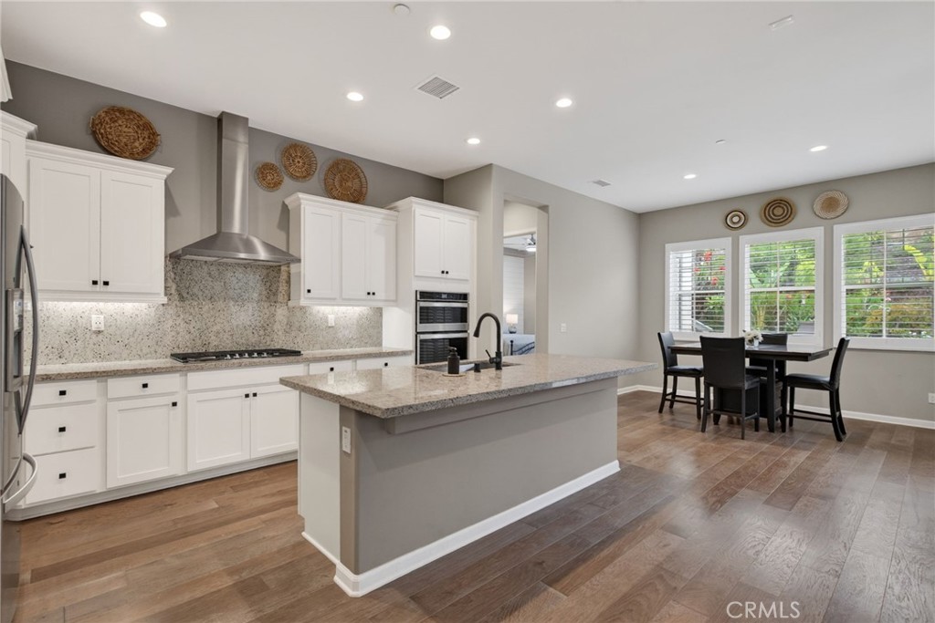 11137 Briar Rose Court Corona, CA 92883 - Photo 14 of 45 kitchen and dinning area
