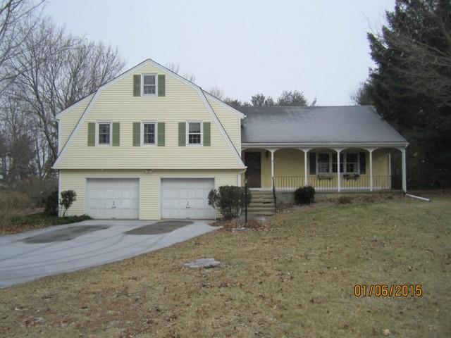 10 Winthrop Road Bethel, CT 06801 - Photo 1 of 1 a front view of a house with yard and seating space