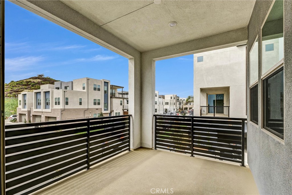 1808 Hollyleaf Terrace Montebello, CA 90640 - Photo 18 of 56 a view of a balcony and a floor to ceiling window