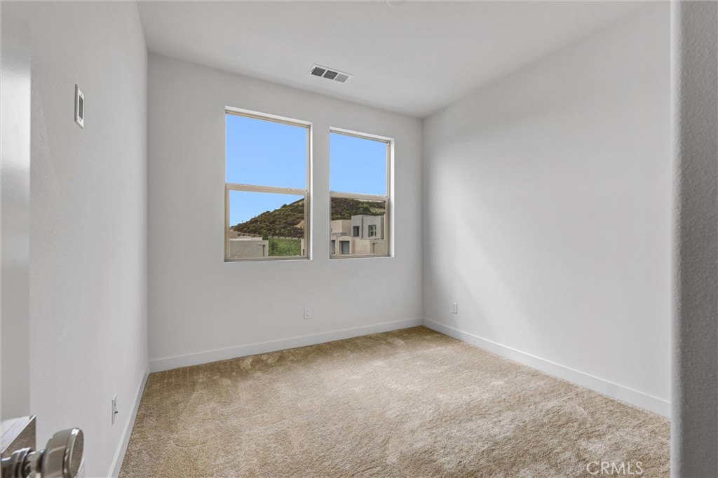 1808 Hollyleaf Terrace Montebello, CA 90640 - Photo 25 of 56 an empty room with a window